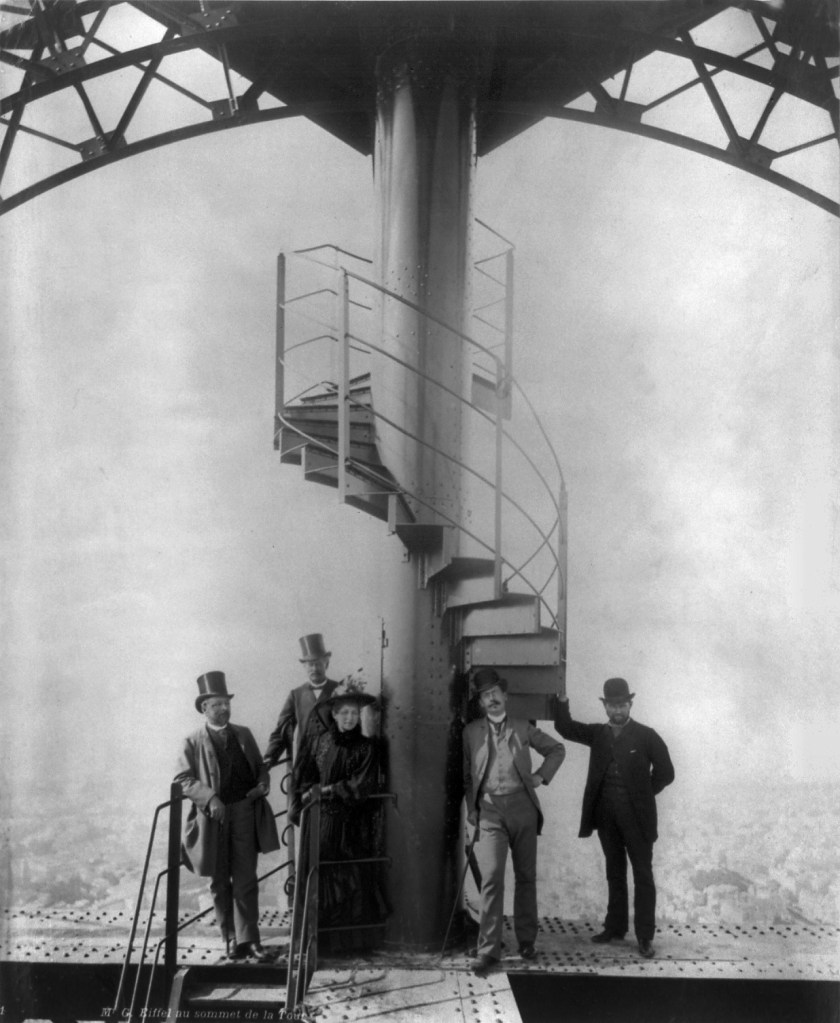 Gustave Eiffel and guest standing near the staircase, which was auctioned off this month, on the top of the Eiffel Tower, during Paris Exposition in 1889. (Library of Congress)