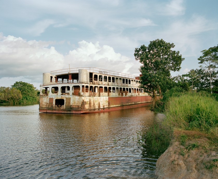 The Peruvian Navy confiscates vessels discovered transporting drugs. The boats are often left abandoned and rusting along the riverbanks. (Yann Gross/Aperture)