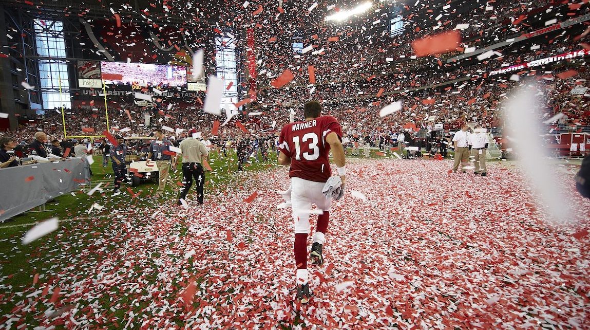 Football: NFC Playoffs: Rear view of Arizona Cardinals QB Kurt Warner (13) victorious, walking through confetti after winning NFC Champhionship game vs Philadelphia Eagles. Glendale, AZ 1/18/2009 CREDIT: Al Tielemans (Photo by Al Tielemans /Sports Illustrated/Getty Images) (Set Number: X81689 TK1 R7 F108 )