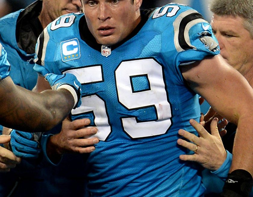 Carolina Panthers linebacker Luke Kuechly (59) is helped onto a cart after being injured in the fourth quarter against the New Orleans Saints at Bank of America Stadium in Charlotte, N.C., on Thursday, Nov. 17, 2016. (Jeff Siner/Charlotte Observer/TNS via Getty Images)