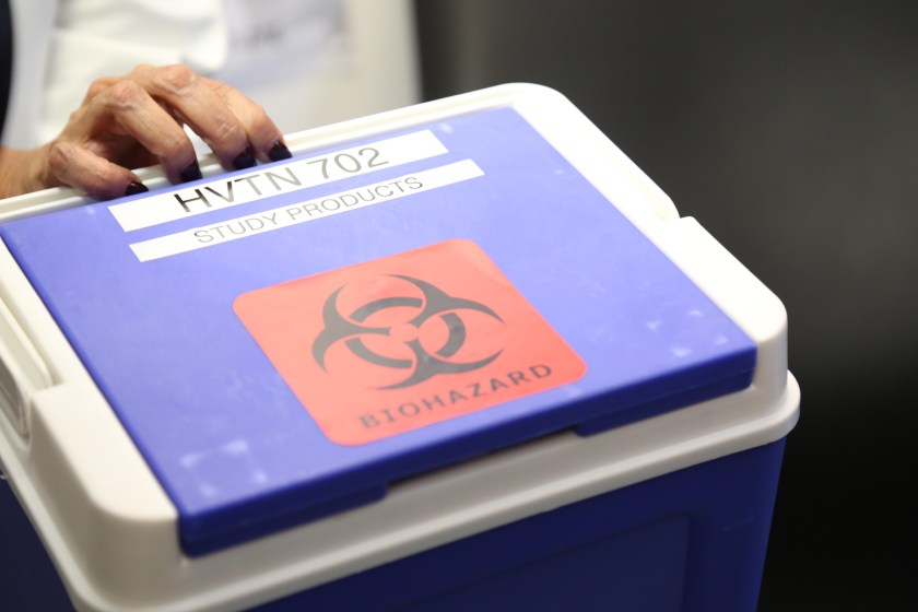 A pharmacist brings an HIV vaccine trial to be injected into one of the first participants at the MRC clinic on November 30, 2016 in KwaZulu-Natal, South Africa. South Africa launched a major clinical trial of an experimental vaccine against the AIDS virus, which scientists hope could be the cure for the disease. (Gallo Images / The Times / Jackie Clausen)