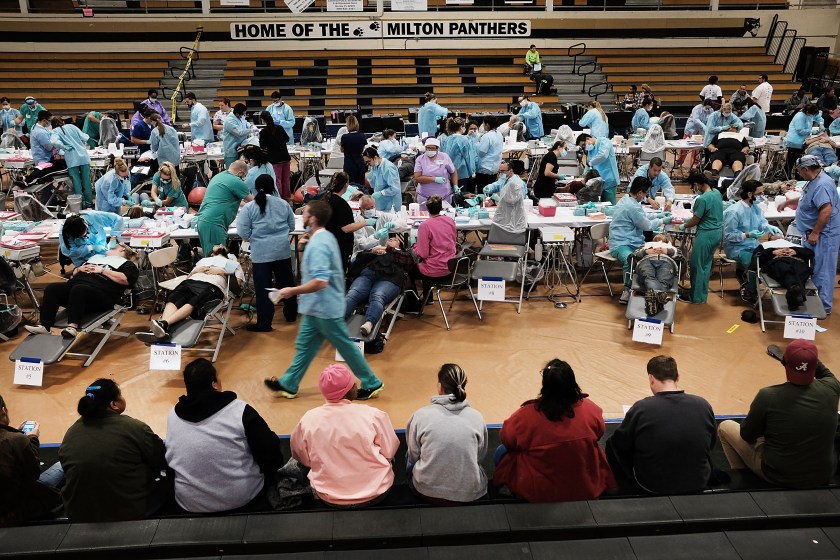 People wait to see a dentist at the Remote Area Medical (RAM) mobile dental and medical clinic on December 3, 2016 in Milton, Florida. (Spencer Platt/Getty Images)