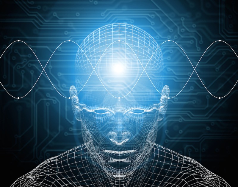 Waves traveling across wire frame of man's brain (Digitally Generated)
