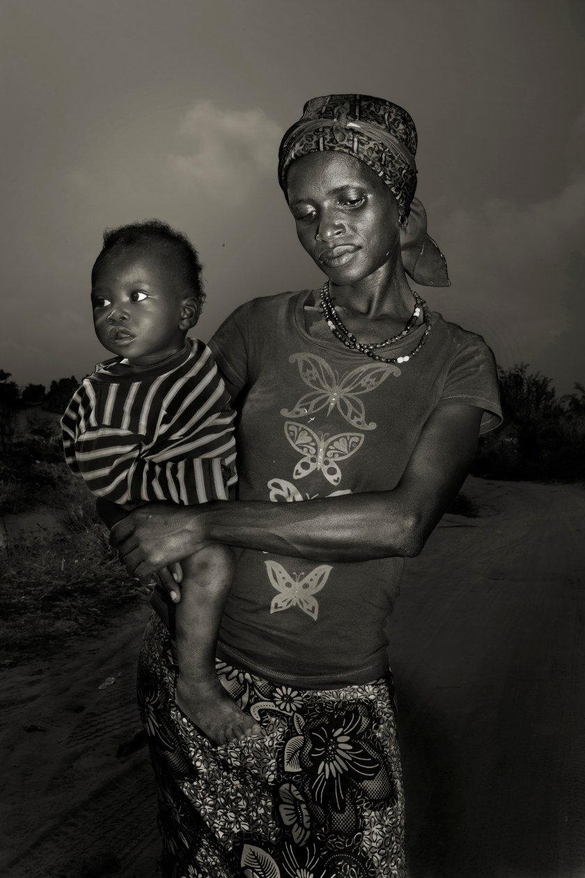 The most widespread epidemic of Ebola virus disease in Sierra Leone ended the 7th October 2015 with 14,122 cases and 3,955 deaths. That required the complex and brave intervention of international NGOs in the attempt to fight the virus. The Italian NGO, Emergency, ran an Ebola treatment center built by DFEED. Thanks to the medical care of Emergency, were able to start a new life. They returned to life finding their families partly or totally killed by the virus. (Marcello Bonfanti/2016 Sony World Photography Awards)