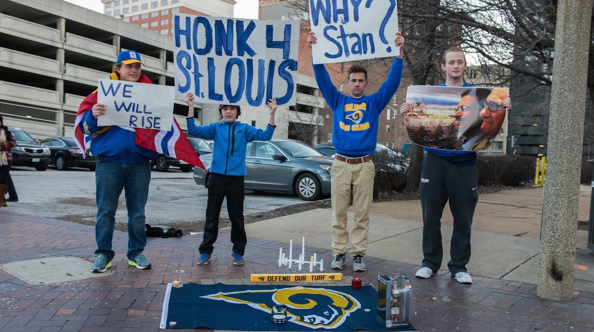 Football fans gather outside the Edward Jones Dome to protest the NFL's decision to allow Rams owner Stan Kroenke to move the team to Los Angeles. (Photo by James A. Cooper/Corbis via Getty Images)
