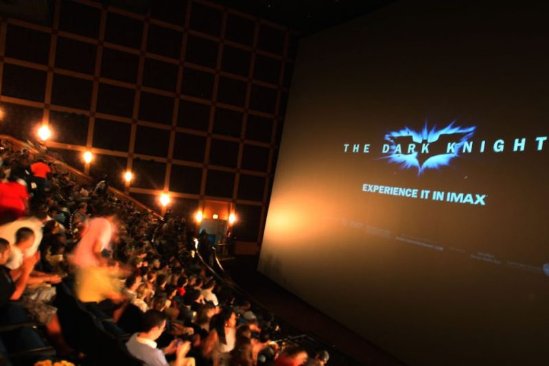 CHICAGO - JULY 17: Members of the audience watch the "The Dark Knight" Chicago midnight screening at the Navy Pier Imax Theater on July 17, 2008 in Chicago, Illinois. (Photo by Tasos Katopodis/Wireimage) *** Local Caption ***