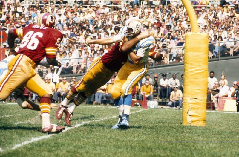 Quarterback Johnny Unitas of the San Diego Chargers in action during a 38-0 loss against the Washington Redksins on September 16, 1973 at RFK Stadium in Washington, DC. (Photo by Nate Fine/Getty Images)
