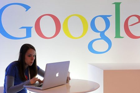 SAN FRANCISCO, CA - JUNE 06: A Google employee works on a laptop before the start of a new conference about Google Maps on June 6, 2012 in San Francisco, California. Google announced new upgrades to Google maps including a feature to download maps and view offline, better 3D mapping and a backpack camera device called Trekker that will allow Street View to go offroad on hiking trails and places only accessible by foot. (Photo by Justin Sullivan/Getty Images)
