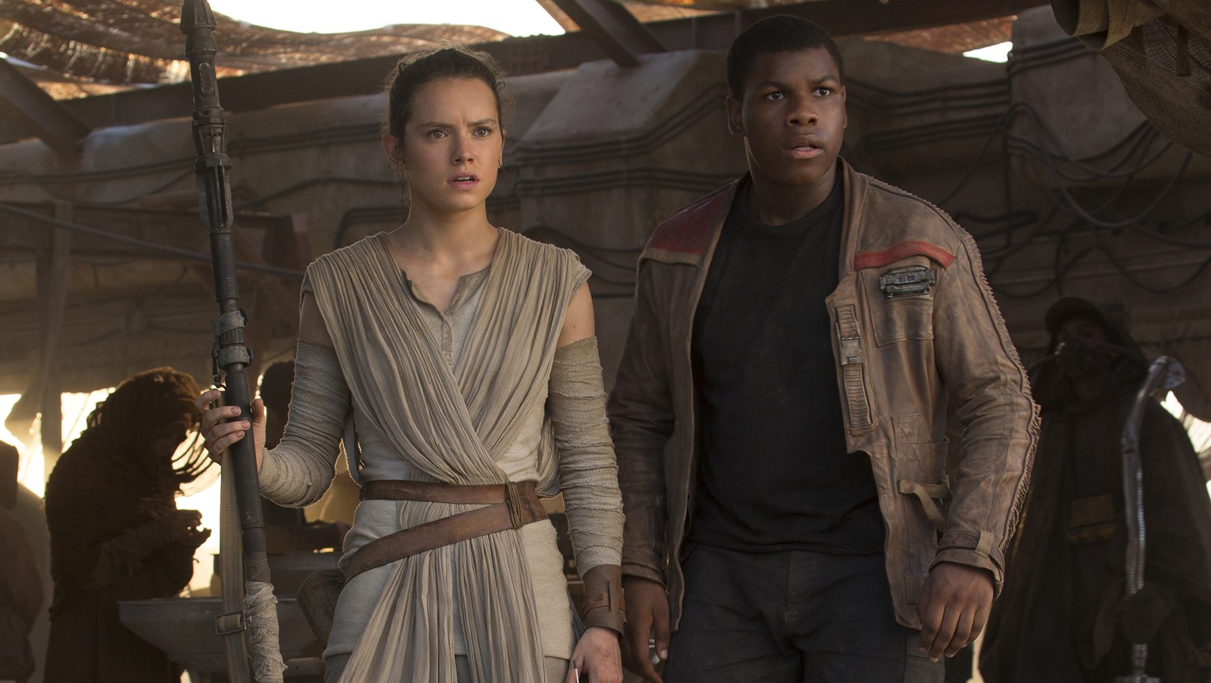 Rey, played by Daisy Ridley, and Finn, played by John Boyega, in a scene from 'The Force Awakens.' (David James/Lucasfilm)