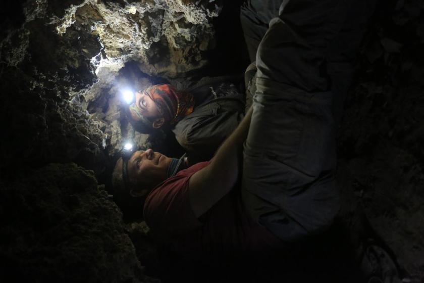 Archaeologists Oren Gutfeld and Ahiad Ovadia, from the Hebrew University's Institute of Archaeology, survey a cave that once contained Dead Sea Scrolls. (Casey L. Olson and Oren Gutfeld)