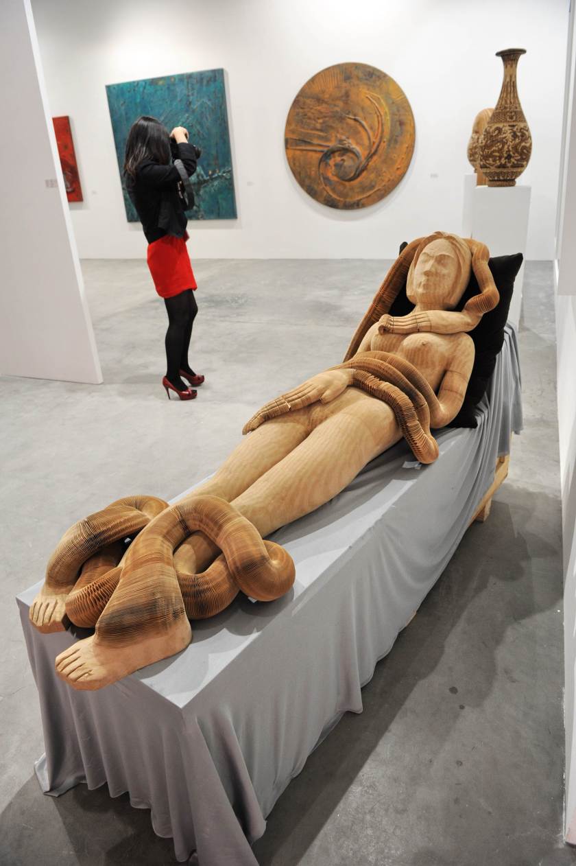 A Paper Sculpture entitled "Girl" created by Chinese sculptor Li Hongbo displayed at Art Stage Singapore. (Roslan Rahman/AFP/Getty Images)