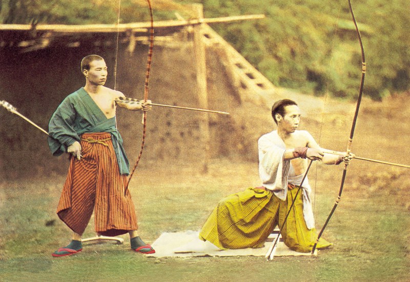 Two Japanese archers take aim at a target, circa 1897. (Buyenlarge/Getty Images)