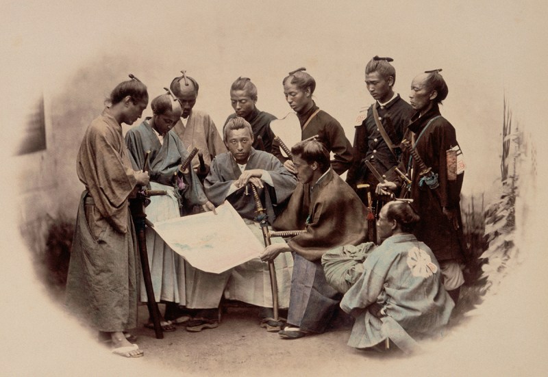 Portrait of a group of Samurai and Japanese officers looking at a map. (Alinari Archives/CORBIS/Corbis via Getty Images)
