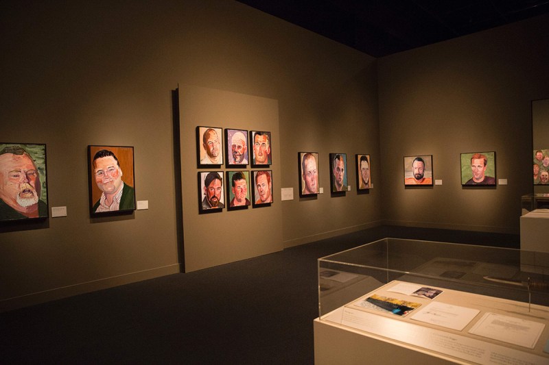 Paintings of wounded US military veterans painted by former US President George W. Bush hang in "Portraits of Courage", a new exhibit at the George W. Bush Presidential Library and Museum in Dallas, Texas, on February 28, 2017. (Laura Buckman/AFP/Getty Images)