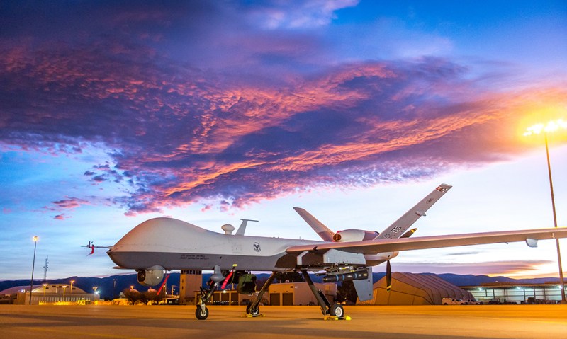 The sun rises over an MQ-9 Reaper remotely piloted aircraft at Holloman Air Force Base, N.M., Dec. 16, 2016. The 49th Aircraft Maintenance Squadron supports the 6th Reconnaissance Squadron as well as the 9th and 29th Attack Squadrons, enabling the graduation of pilots and sensor operators in support of the Air Force's largest formal training unit. Additionally, Airmen with the 49th AMS continuously deploy in support of intelligence, surveillance, and reconnaissance requirements. (U.S. Air Force photo by J.M. Eddins Jr.)