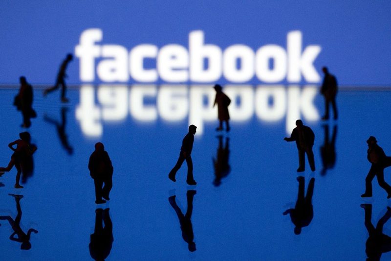 Picture taken on May 12, 2012 in Paris shows an illustration made with figurines set up in front of Facebook's homepage. Facebook, already assured of becoming one of the most valuable US firms when it goes public later this month, now must convince investors in the next two weeks that it is worth all the hype. Top executives at the world's leading social network have kicked off their all-important road show on Wall Street -- an intense marketing drive ahead of the company's expected trading launch on the tech-heavy Nasdaq on May 18. AFP PHOTO/JOEL SAGET (Photo credit should read JOEL SAGET/AFP/Getty Images)