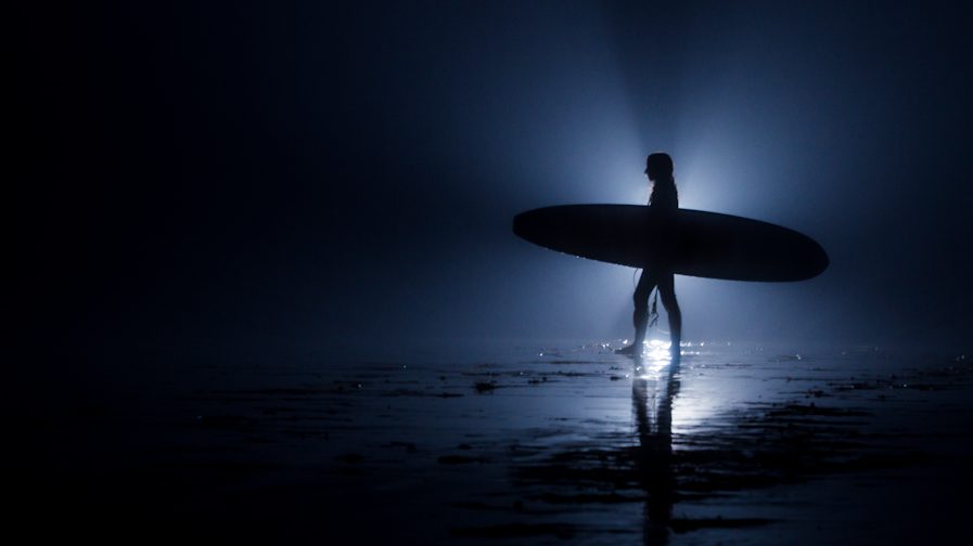 New Surfing Trend: Surfing at Night Under the Moon
