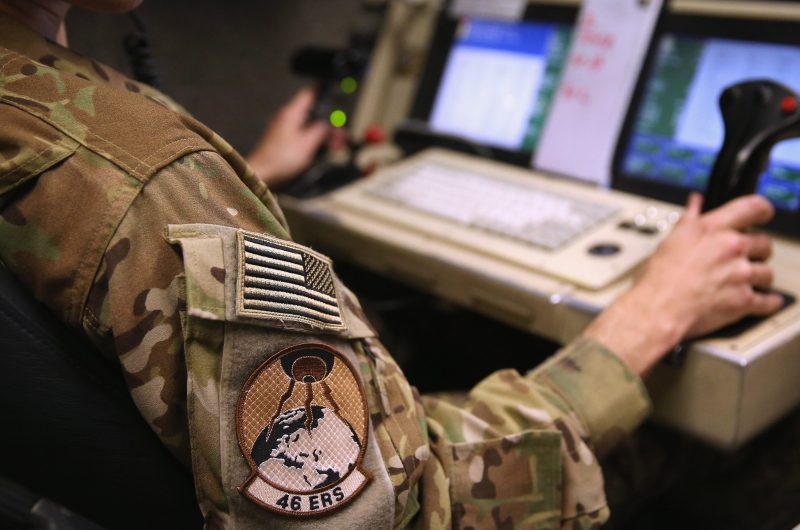 A pilot prepares to launch a U.S. Air Force MQ-1B Predator unmanned aerial vehicle (UAV), from a ground control station at a secret air base in the Persian Gulf region on January 7, 2016. (John Moore/Getty Images)