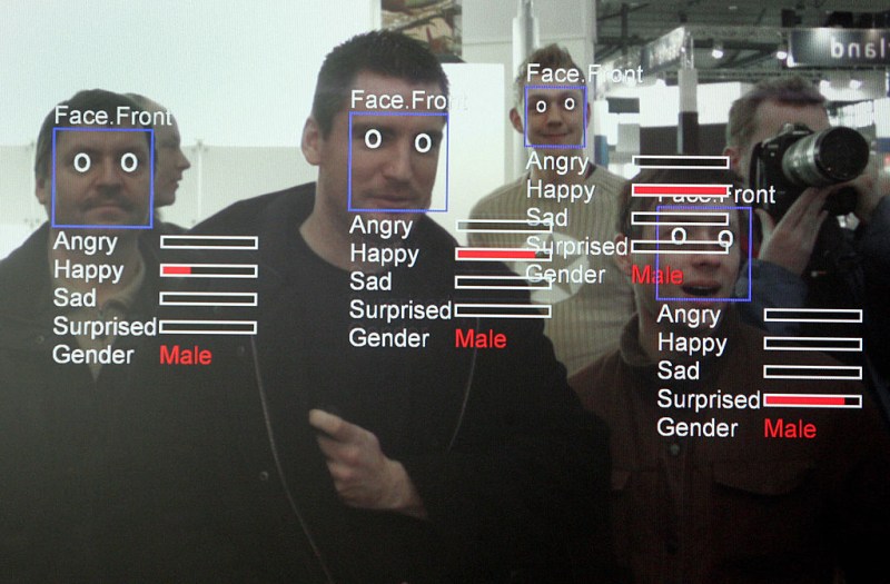 A photo of a computer screen running "Real Time Face Detector" software shows visitors' expressions analysed and explained in real time at the stand of the Fraunhofer Institute at the CeBIT trade fair in Hanover on March 6, 2008. The Real Time Face Detector is a software module that can be used for fast face detection in videostreams and single pictures. AFP PHOTO JOHN MACDOUGALL (Photo credit should read JOHN MACDOUGALL/AFP/Getty Images)