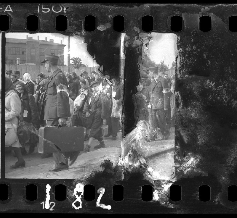 Ghetto police escorting residents for deportation (Henryk Ross/Art Gallery of Ontario)