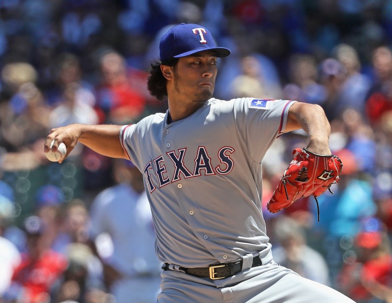 CHICAGO, IL - JULY 16: Starting pitcher Yu Darvish #11 of the Texas Rangers delivers the ball against the Chicago Cubs at Wrigley Field on July 16, 2016 in Chicago, Illinois. (Photo by Jonathan Daniel/Getty Images)