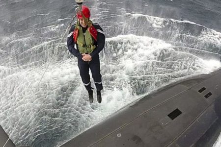Emmanuel Macron was lowered down from a helicopter on to the submarine in the Atlantic. (@EmmanuelMacron/Twitter)