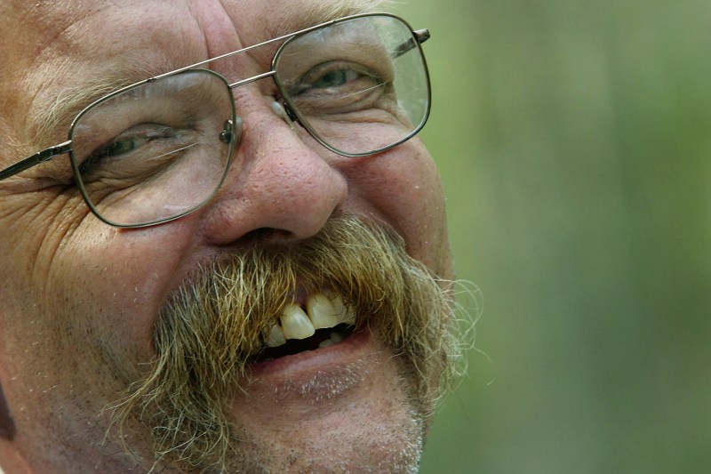 CARYVILLE, TN - MARCH 31: Race organizer Gary Cantrell is all smiles and laughs as he listens to the horror stories the competitors went through while hiking through the mountains during the Barkley Marathon on March 31, 2007 at the Frozen Head Lake State Park in Caryville, TN. (Photo by Preston Keres/The Washington Post via Getty Images)