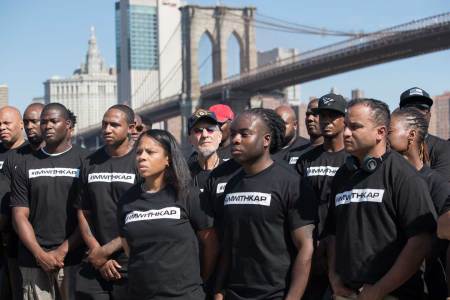 Retired New York City Police Officer Frank Serpico, center, stands with other members of law enforcement during a rally to show support for Colin Kaepernick, Saturday, Aug. 19, 2017, in New York. Kaepernick, the former quarterback for the San Francisco 49ers, became a controversial figure last year after he refused to stand for the national anthem. He said it was a protest against oppression of black people. (AP Photo/Mary Altaffer)