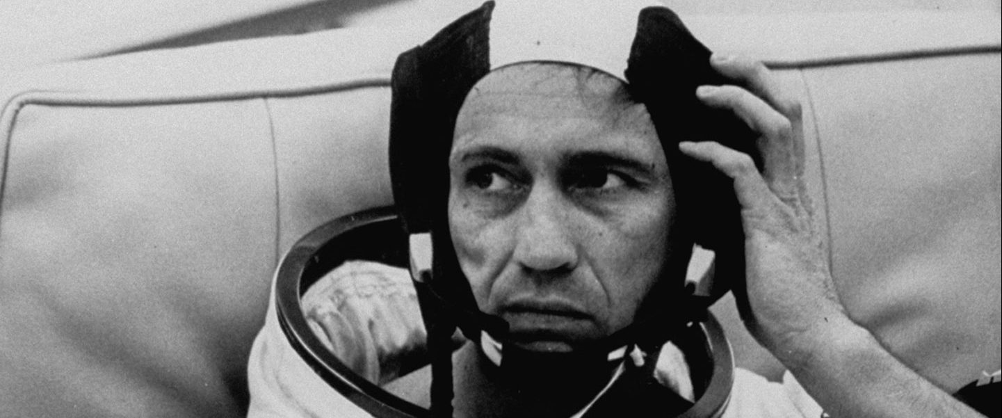 Astronaut Donn F. Eisele sitting back in full attached uniform while adjusting the left side of his head gear. (Photo by Time Life Pictures/NASA/The LIFE Picture Collection/Getty Images)