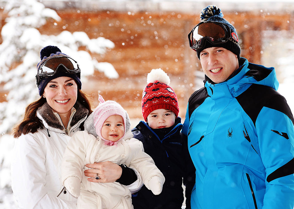 Catherine, Duchess of Cambridge (L) and Prince William, Duke of Cambridge (R), pose with their children, Princess Charlotte (2L) and Prince George (2R), during a private break skiing at an undisclosed location in the French Alps on March 3, 2016.  (John Stillwell/Getty)