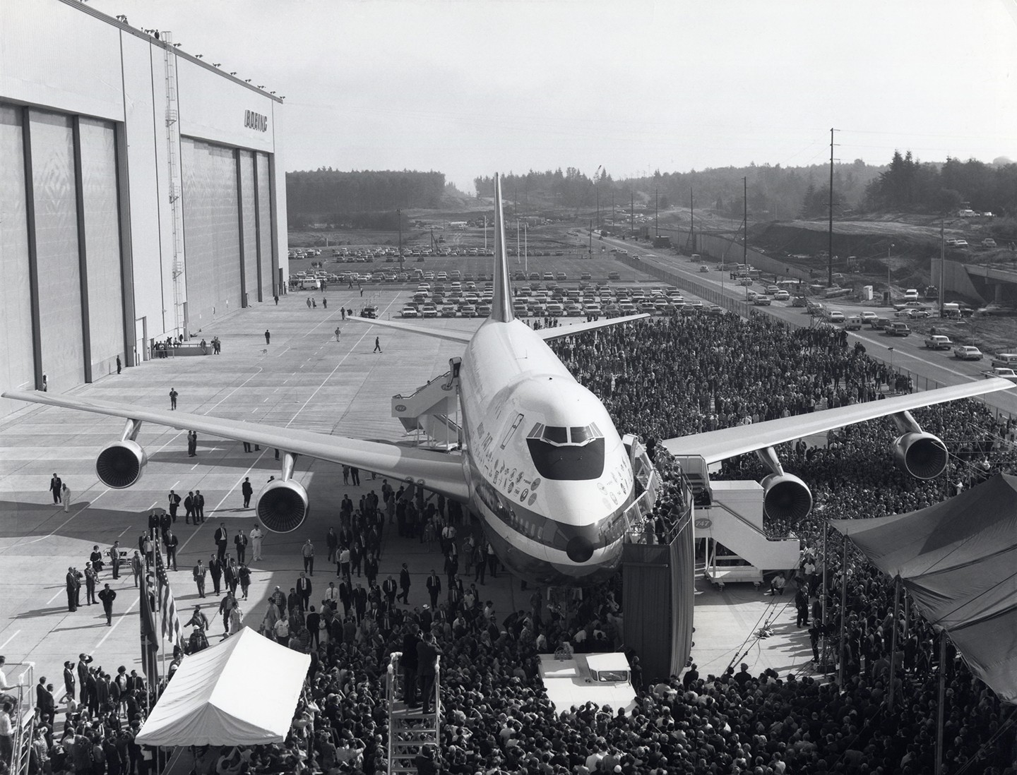 The prototype of the 'Jumbo' being rolled out of its purpose-built factory - the largest building ever built - at Everett, Washington, USA. The world's largest passenger aeroplane, the Boeing 747 carries up to 400 people. The aircraft first entered service in 1970.  (SSPL/Getty Images)
