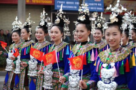 Members of the Dong ethnic minority in traditional costumes parade during their traditional Dong Year festival on December 18, 2017 in Liping, China. The Dong Year is the traditional festival of China's Dong ethnic minority, and it is celebrated during the eleventh lunar month, from the first day to the eleventh day.  (Photo by Qu Honglun/China News Service/VCG via Getty Images)