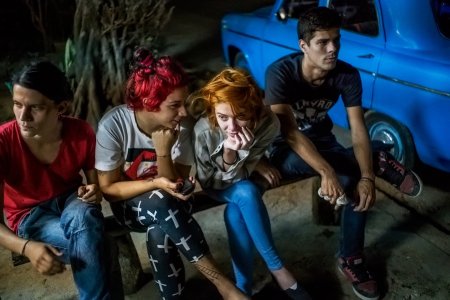 Helena and her friends wait for $1.00 pizza. (Courtesy Michael Christopher Brown)