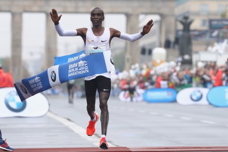 Eliud Kipchoge of Kenya celebrates winning the BMW Berlin Marathon 2017 on September 24, 2017 in Berlin, Germany.  (Photo by Alexander Hassenstein/Getty Images For BMW)