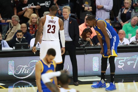 LeBron James #23 of the Cleveland Cavaliers talks with Steve Kerr of the Golden State Warriors in Game Four of the 2017 NBA Finals on June 9, 2017 at Quicken Loans Arena in Cleveland, Ohio. NOTE TO USER: User expressly acknowledges and agrees that, by downloading and/or using this photograph, user is consenting to the terms and conditions of the Getty Images License Agreement. Mandatory Copyright Notice: Copyright 2017 NBAE (Photo by Jeff Haynes/NBAE via Getty Images)