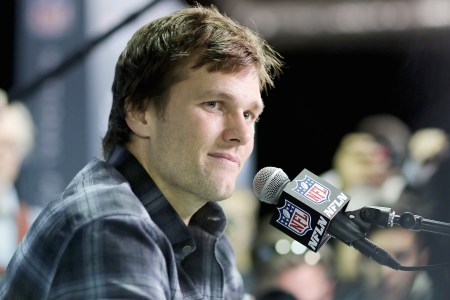 Tom Brady #12 of the New England Patriots speaks to the press during the New England Patriots Media Availability for Super Bowl LII at the Mall of America on February 1, 2018 in Bloomington, Minnesota.The New England Patriots will take on the Philadelphia Eagles in Super Bowl LII on February 4.  (Photo by Elsa/Getty Images)