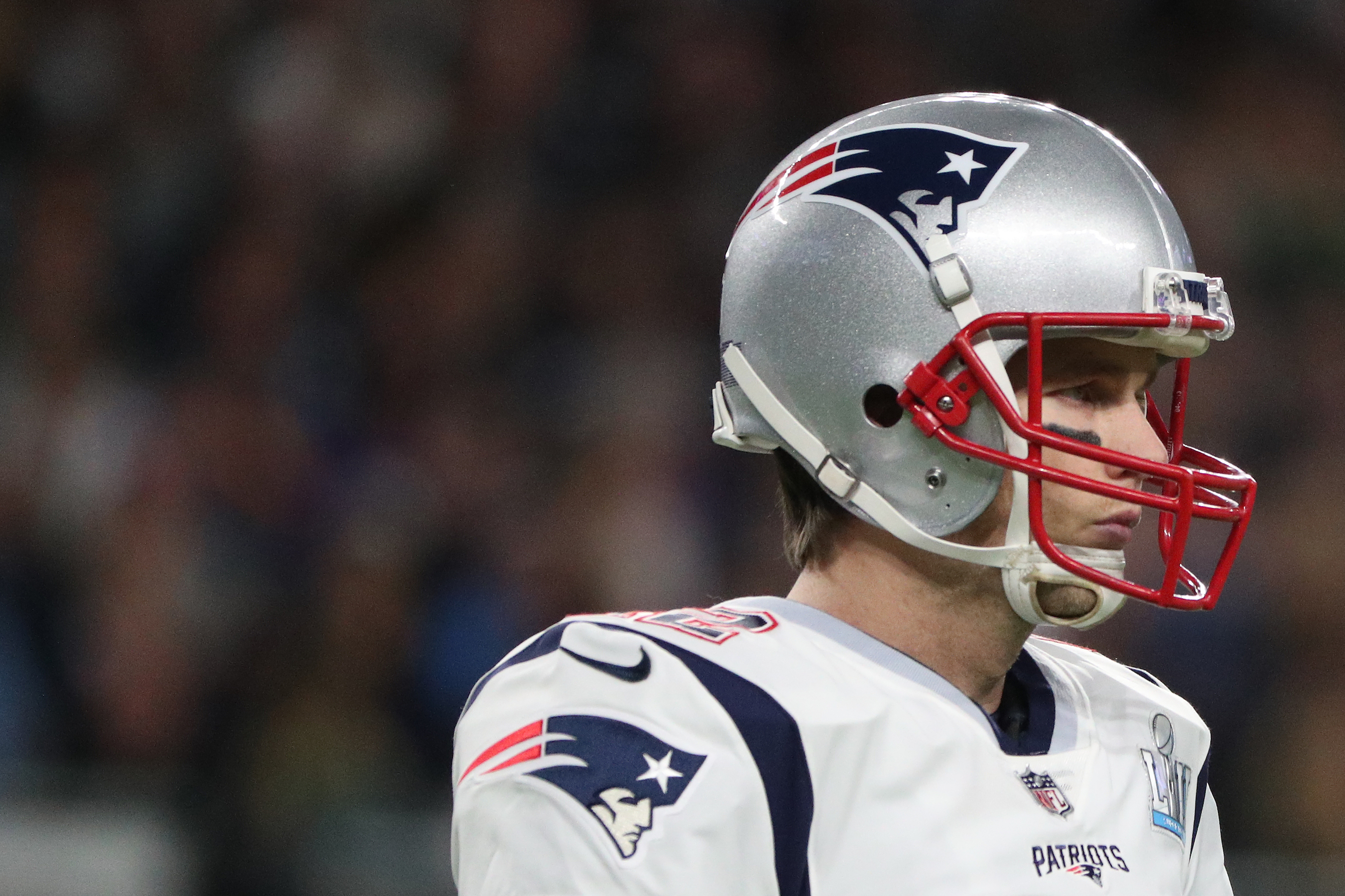 Tom Brady #12 of the New England Patriots looks on against the Philadelphia Eagles in Super Bowl LII at U.S. Bank Stadium on February 4, 2018 in Minneapolis, Minnesota. (Photo by Patrick Smith/Getty Images)