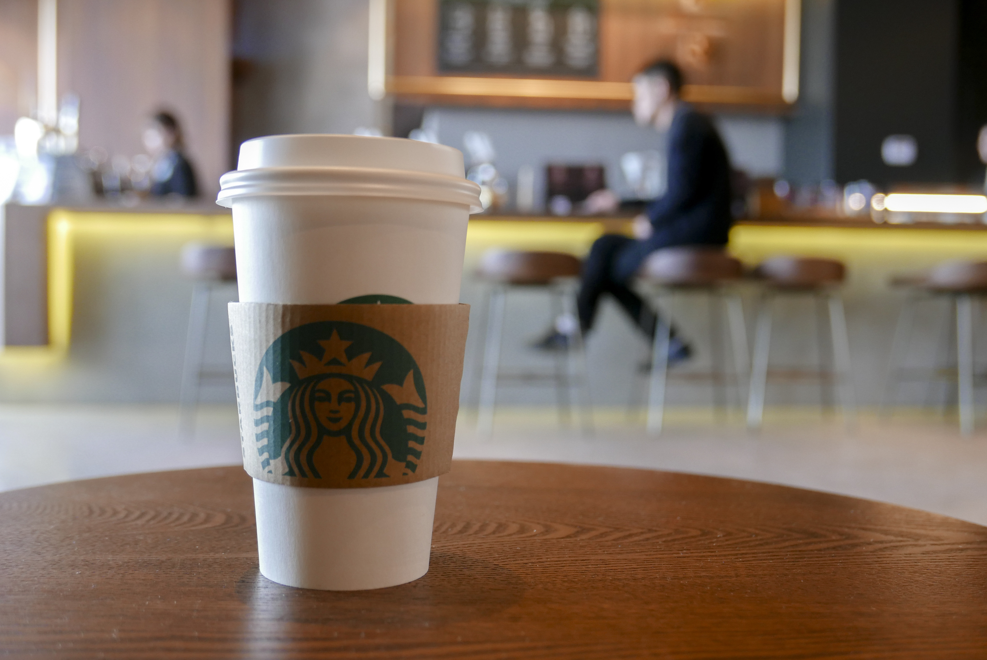 A coffee cup in a Starbucks coffee shop, arranged for photography.  Since January 1st, Starbucks took back the management rights of more than 1300 stores in East China from the agent's hands, and has achieved 100% running and ownership in the mainland of China. The move is to speed up its expansion and development in China. (Photo by Zhang Peng/LightRocket via Getty Images)