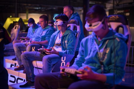 Pilots steer their drones with a RC controllers at Station Berlin during the DCL - Drone Champions League  Championship Finals in Berlin on December 02, 2017.  (Getty Images)
