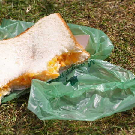 One of Augusta National's famed pimento cheese sandwiches at the 2011 Masters. We take a look at the history behind the iconic golfing sandwich.