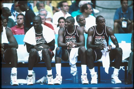 1992:  Michael Jordan (L), Magic Johnson (M) and Clyde Drexler (R) of Team USA, the Dream Team, sit on the bench during the men's basketball competition at the 1992 Summer Olympics in Barcelona, Spain. (Photo by Icon Sportswire)