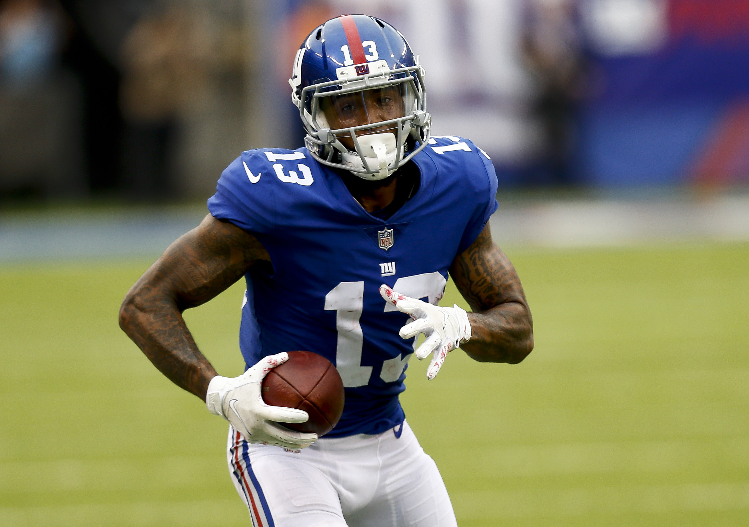 Odell Beckham #13 of the New York Giants runs in for a touchdown  during their game against Los Angeles Chargers at MetLife Stadium on October 8, 2017 in East Rutherford, New Jersey. (Photo by Jeff Zelevansky/Getty Images)