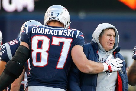 Rob Gronkowski #87 of the New England Patriots reacts with head coach Bill Belichick after catching a touchdown pass during the third quarter of a game against the Miami Dolphins at Gillette Stadium on November 26, 2017 in Foxboro, Massachusetts.  (Photo by Jim Rogash/Getty Images)