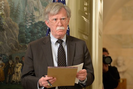WASHINGTON, DC - APRIL 13: National Security Advisor John Bolton listens to remarks by U.S. President Donald Trump as he speaks to the nation, announcing military action against Syria for the recent apparent gas attack on its civilians, at the White House, on April 13, 2018, in Washington, DC. President Trump announced that a joint operation of "precision strikes" is underway in Syria with armed forces from the United Kingdom and France.  (Photo by Mike Theiler - Pool/Getty Images)