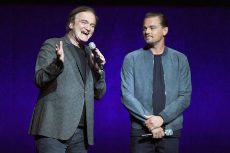 Director Quentin Tarantino (L) and Actor Leonardo DiCaprio speak onstage during CinemaCon 2018 (Photo by Ethan Miller/Getty Images for CinemaCon)