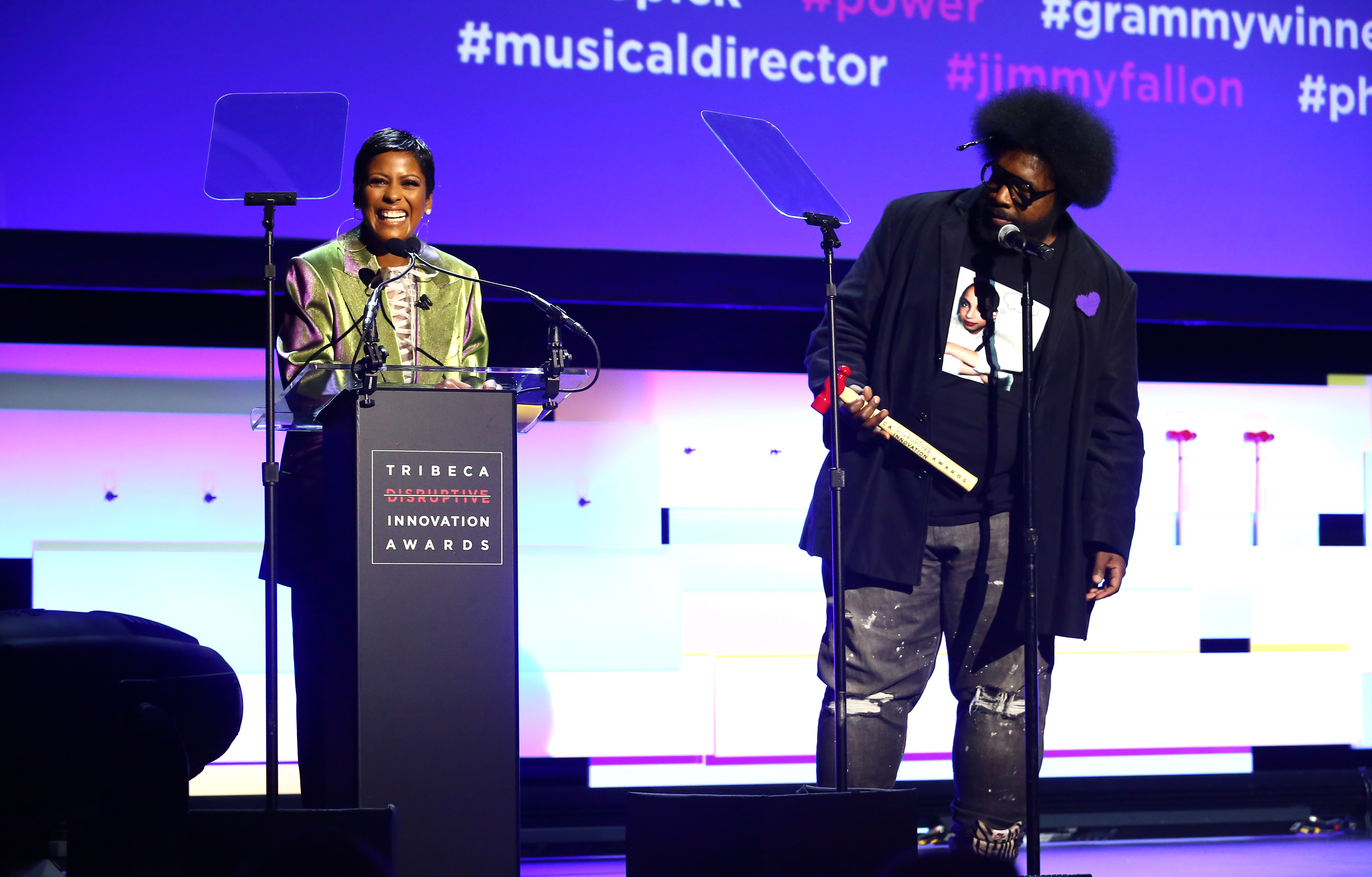 Tamron Hall and Questlove speak on stage during Tribeca Disruptive Innovation Awards - 2018 Tribeca Film Festival at Spring Studios on April 24, 2018 in New York City.  (Photo by Astrid Stawiarz/Getty Images for Tribeca Film Festival.)