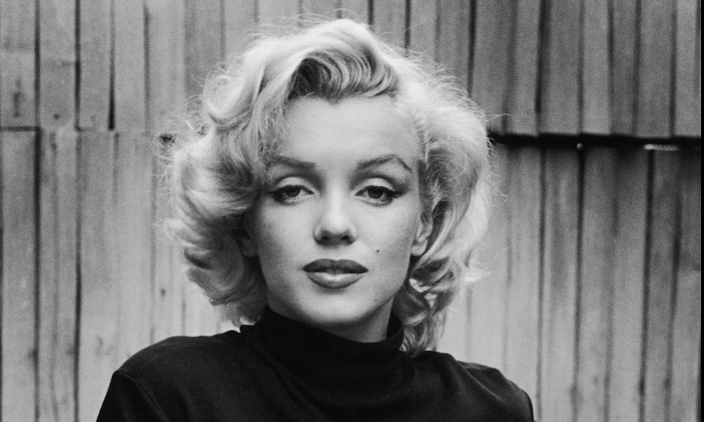 Portrait of American actress Marilyn Monroe (1926 - 1962) as she poses on the patio outside of her home, Hollywood, California, May 1953. (Photo by Alfred Eisenstaedt/The LIFE Picture Collection/Getty Images)
