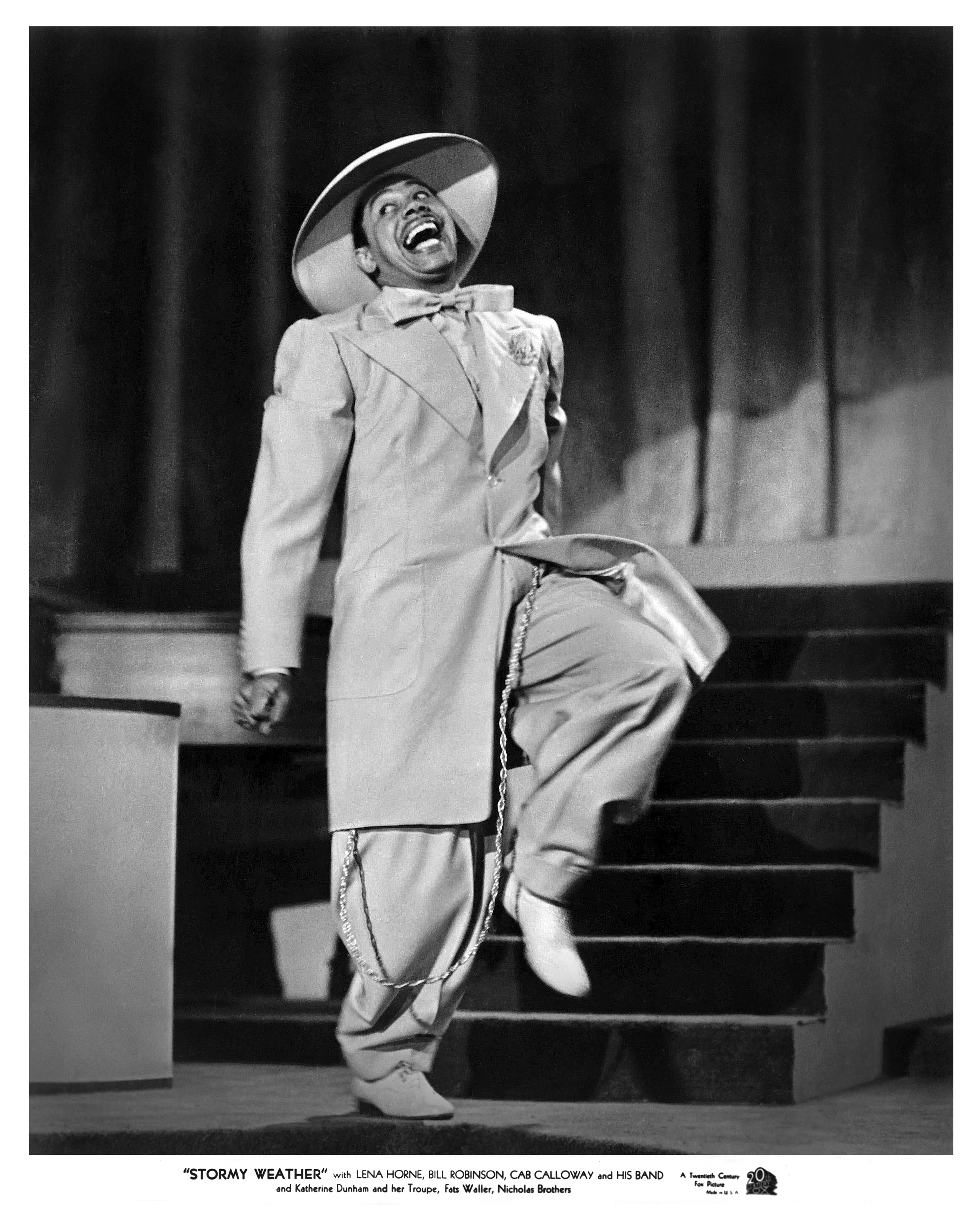 Publicity still portrait of American bandleader and actor Cab Calloway in a zoot suit in the all-black-cast musical 'Stormy Weather' (20th Century Fox), 1943. (Photo by John D. Kisch/Separate Cinema Archive/Getty Images)