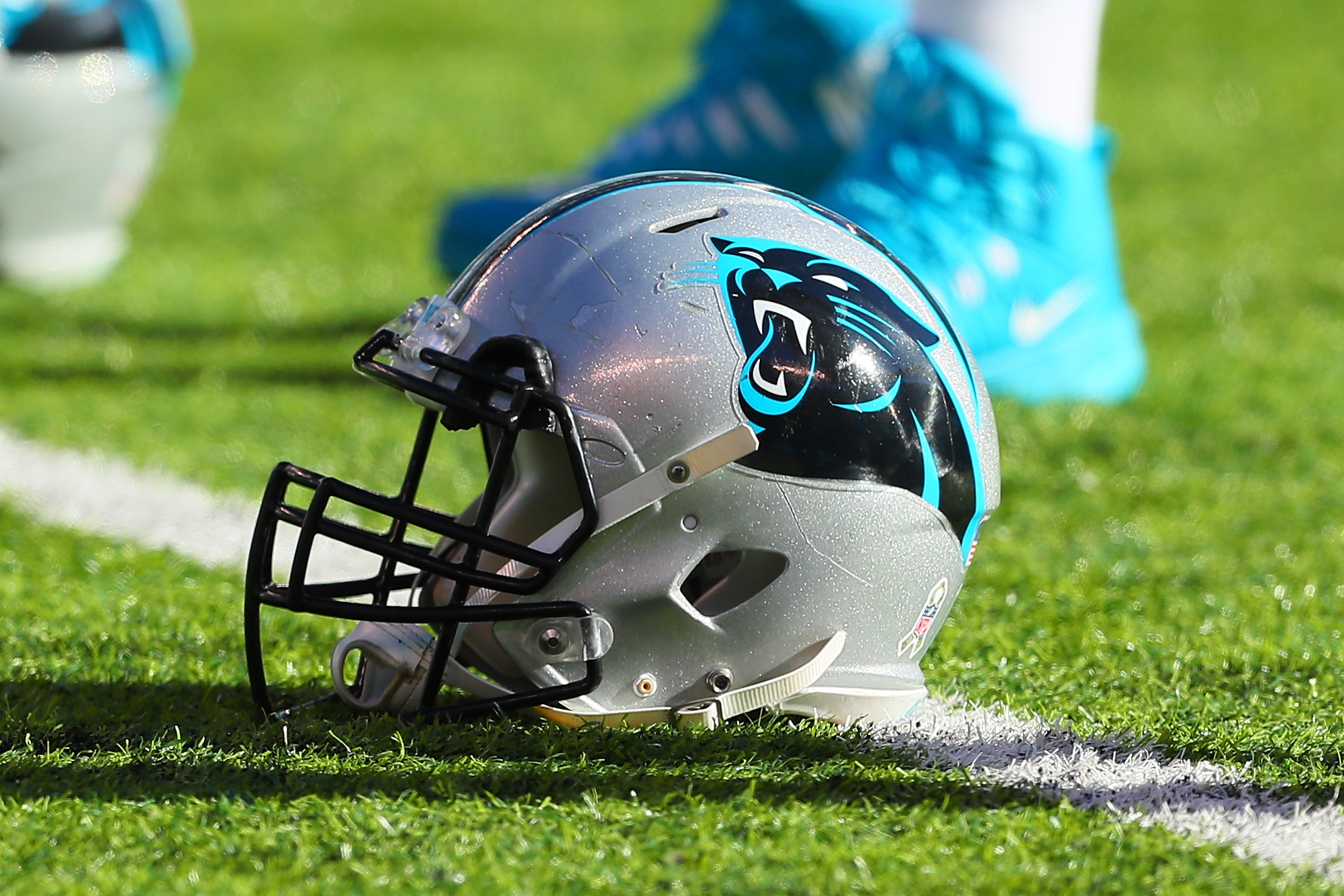 A Carolina Panthers helmet on the field prior to the National Football League game between the New York Jets and the Carolina Panthers on November 26, 2017, at MetLife Stadium in East Rutherford, NJ.   (Photo by Rich Graessle/Icon Sportswire via Getty Images)