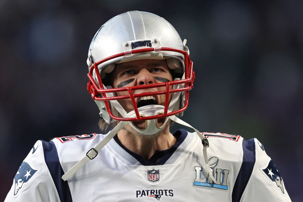 Tom Brady #12 of the New England Patriots takes the field before playing against the Philadelphia Eagles in Super Bowl LII at U.S. Bank Stadium on February 4, 2018 in Minneapolis, Minnesota. (Photo by Patrick Smith/Getty Images)